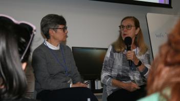 3 women speaking on a panel