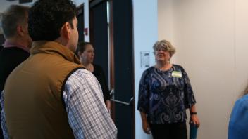 Woman talking to group