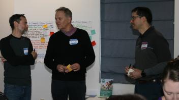 3 men talking